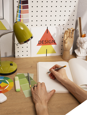 Graphic designers and printing experts at work in Dimension Multimedia office